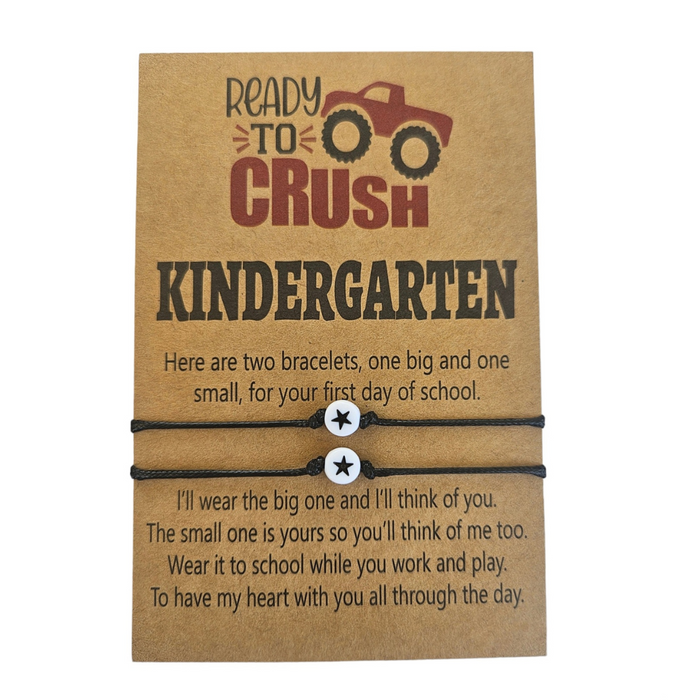2 black bracelets with stars on a message card for first day of kindergarten