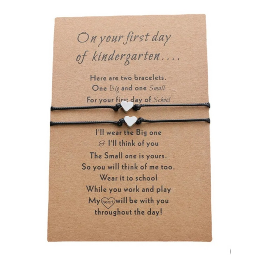 Set of black string bracelets with metal heart charms for first day of kindy