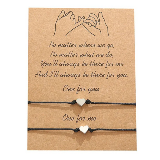 Friendship black string bracelets on a message card
