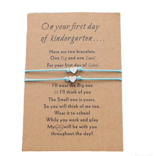 Blue bracelet set with heart charms on a message card