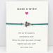 Turquoise bracelet with turtle charm on a white friendship card
