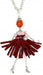 long chain silver necklace with doll pendant. doll is silver with maroon material skirt, belt with stone feature, pink top and orange head. doll charm has rhinestone like high heels